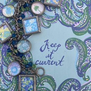Handmade charm bracelet with Lilly Pulitzer fabric prints under glass